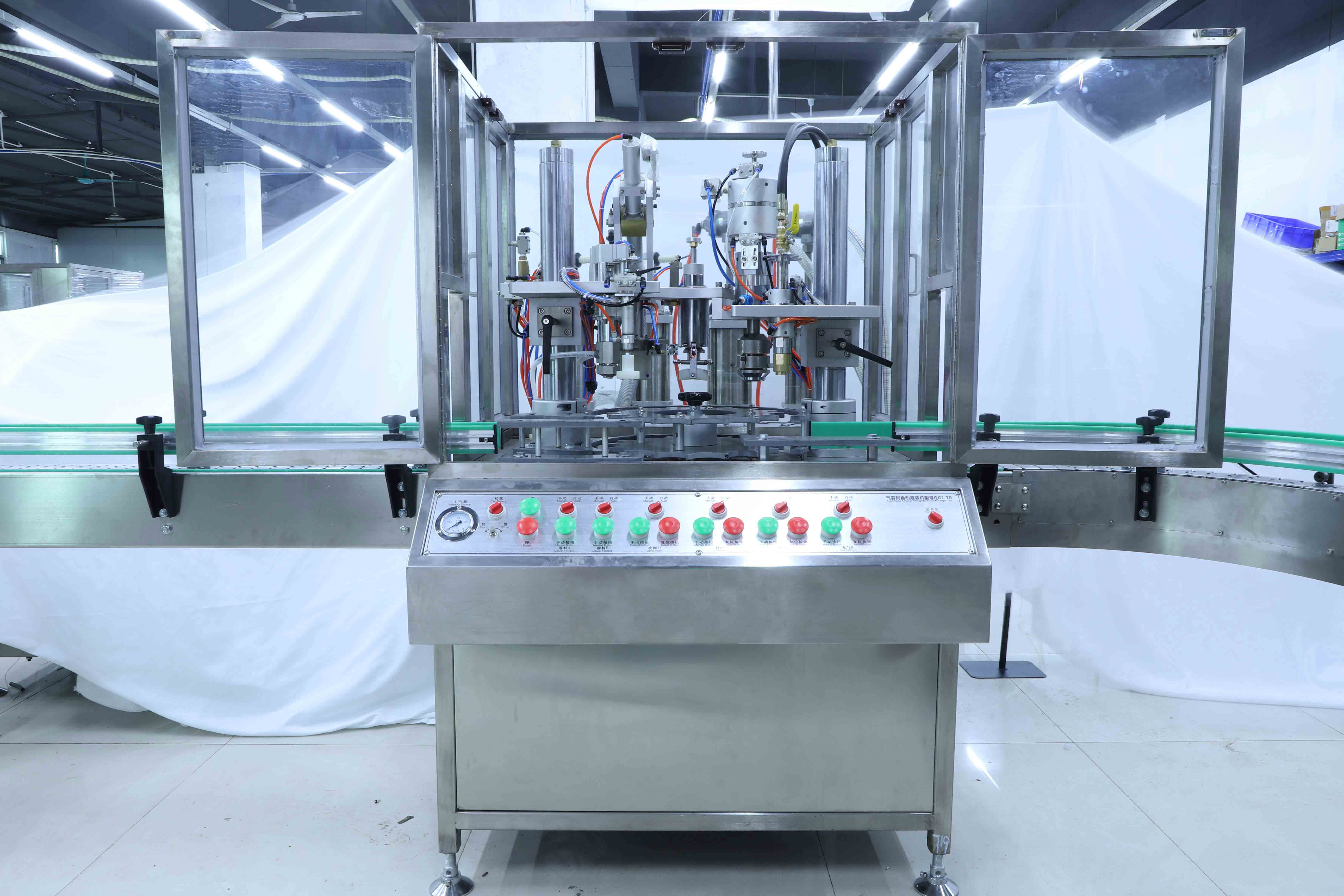 Aerosol filling sealing machine Аерозольна наповнювальна машина